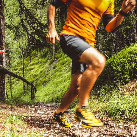 Photo of runner outside for Outdoors + Fitness collection image