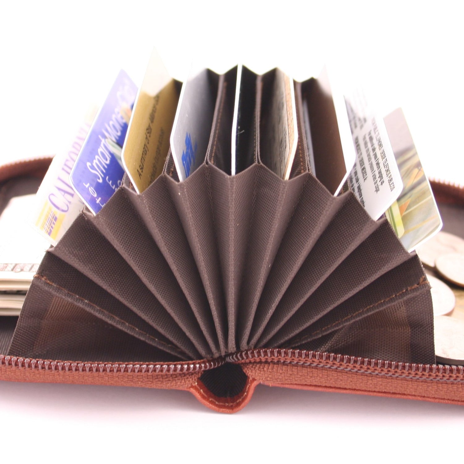Storus Smart Accordion Wallet open and fanned filled with money and cards