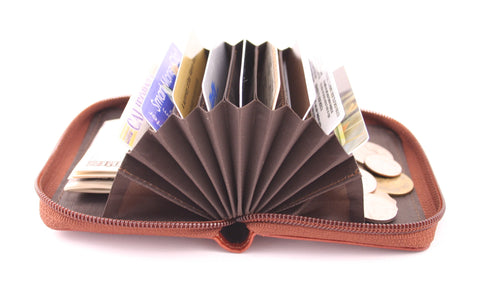 Storus Smart Accordion Wallet open and fanned filled with money and cards