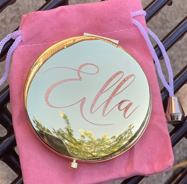Mia Beauty Jeweled Compact mirror with gold metal and gold glass rhinestone shown engraved with Ella in script font