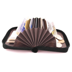 Storus Smart Accordion Wallet open and fanned filled with money and cards