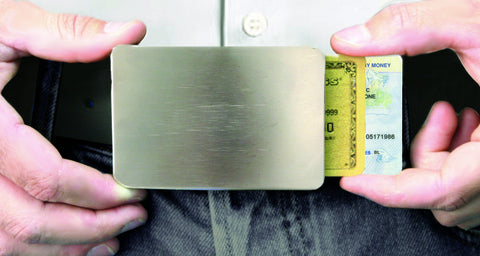 Storus® Smart Belt Buckle™ on person with hands sliding out cards.