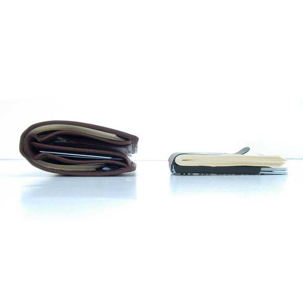 bulky leather wallet with exact amount of cards and cash next to a slim Smart Money Clip